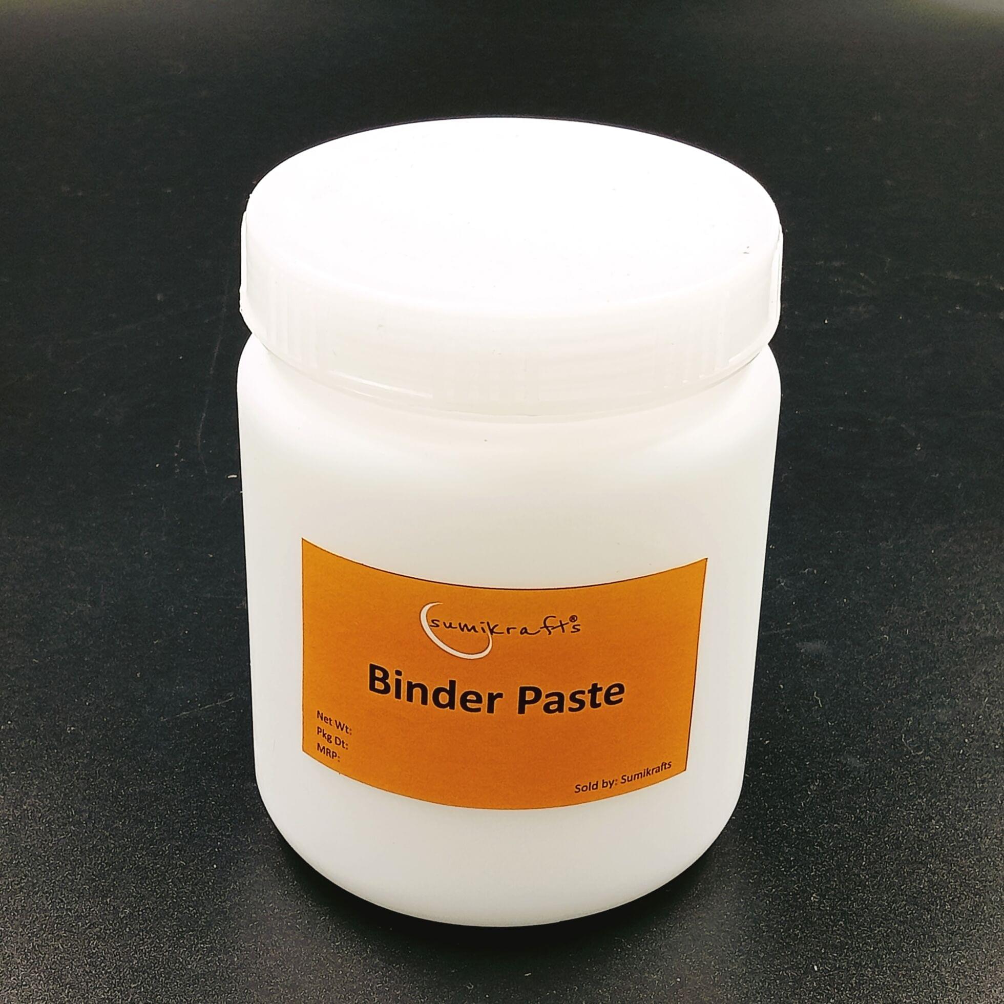 Binder paste, thick adhesive mixture, used in paper binding, white or off-white color, smooth consistency, sticky texture, often used in crafting, DIY projects, or bookbinding